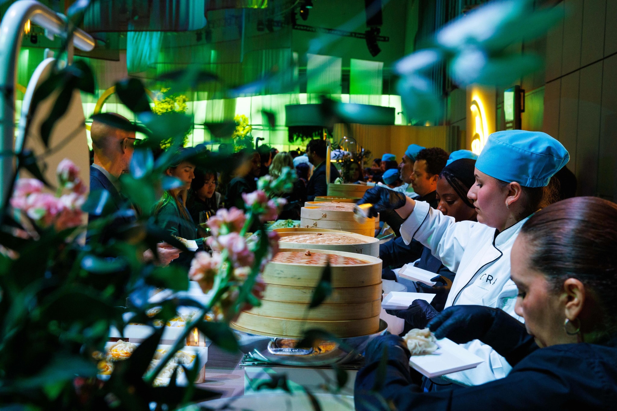 Javits catering team serving event attendees.